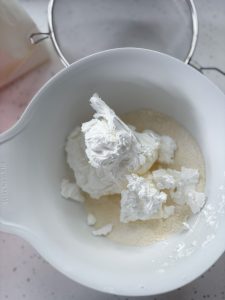 Dry ingredients and meringue for making macarons ready to be combined