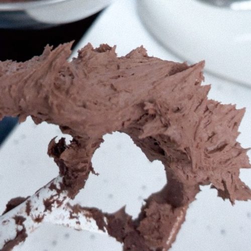 Chocolate Fudge Buttercream recipe image of buttercream on whisk