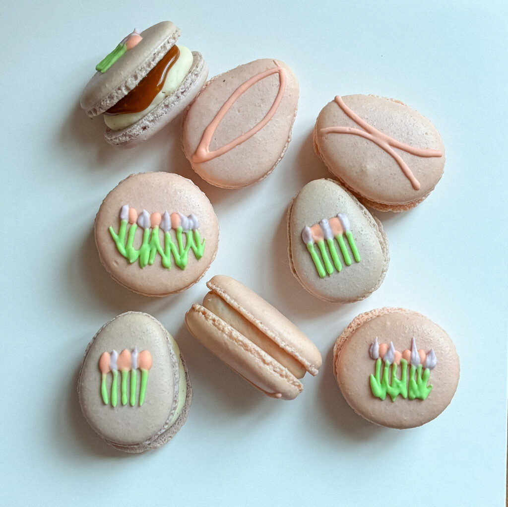 Mother's day floral macarons. Purple and pink coloured with Royal Icing decoration - Tulip Macarons