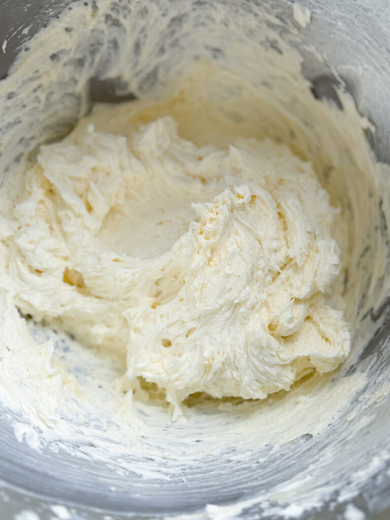 Whisked Vanilla Buttercream Macaron Filling recipe step- buttercream in mixing bowl