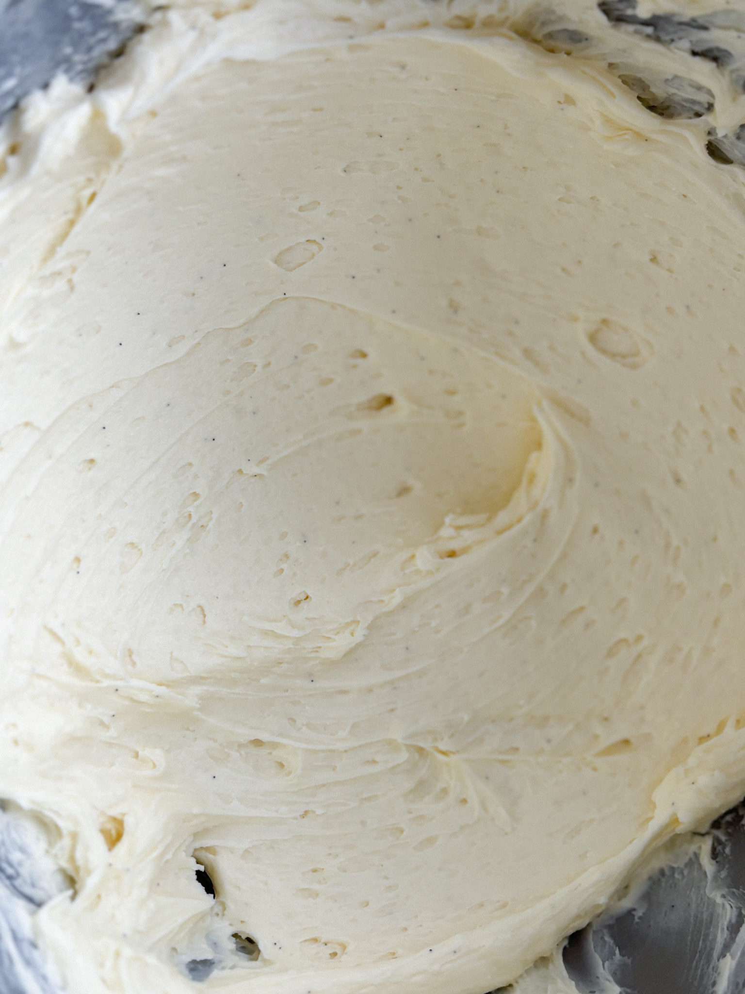 Smooth finished vanilla buttercream macaron filling in mixing bowl