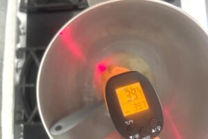 Lemon Macarons process step swiss meringue showing temperature testing