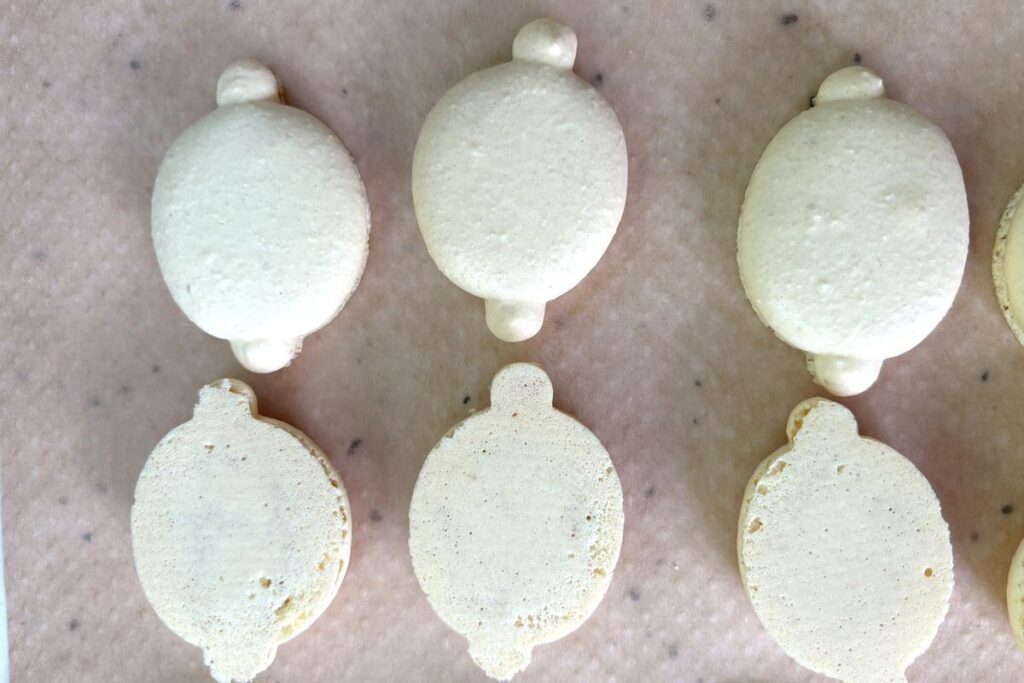 Lemon macarons paired ready for filling